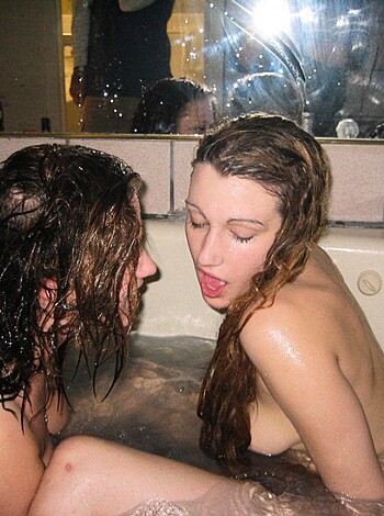 Two Girls are taking a bath and shave your pussy  - Photo 13