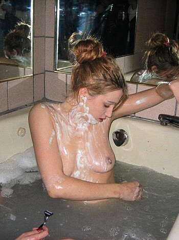Three naked broads are shaving their ginger leg hair off in a tub full of warm water, and it feels fucking amazing, I promise you that.