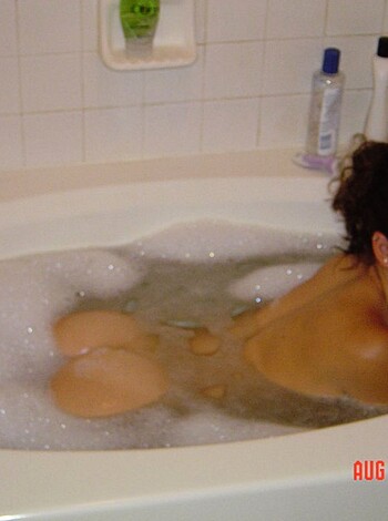 A fucking babe is soaking her ass off in a hot tub with no clothes on.