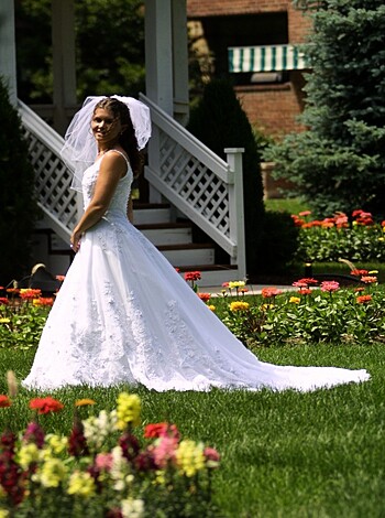 "Yo check out this picture of some bitch in a fucking pearly white weddin' gown, bro."