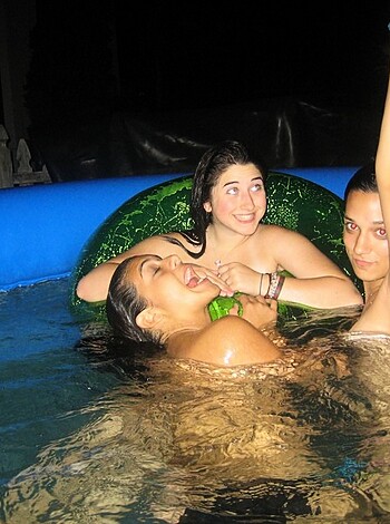 Three naked girls making fun in pool - Photo 15