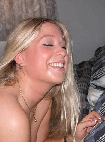 Blonde long-haired teen showing shaved pussy on bed - Photo 33