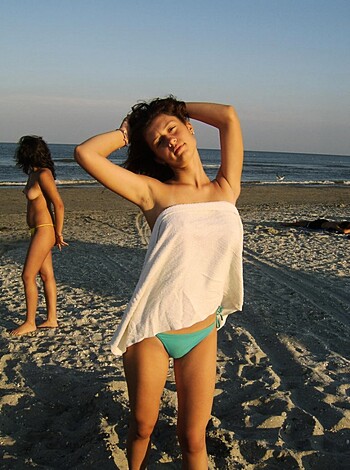 Nice girls at trip to nude beach - Photo 32