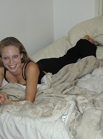 "Check out this bitch in her sexy black lacy underwear getting some fuckin' cock on a pristine white goddamn mattress, motherfucker!"