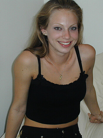 """
Here's a chick with tits so huge that they're spilling out of her shirt, completely unsupported by any kind of bra or support. And if you think she's got 'em, wait until you see the rest of her. 
"""