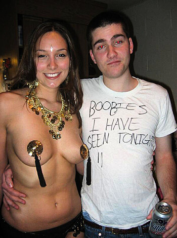 A naked chick is dressed up like a dog with a leash around her neck, while her bell jingles as she moves.