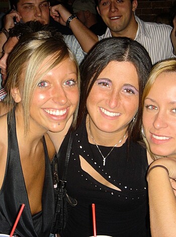 """
Check out these three bitches partying it up, getting fucked up and looking fucking hot as shit in this photo!
""".