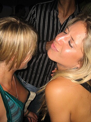 Here's a photo of a hot chick in a skimpy two-piece that leaves fuckin' nothing to the imagination, man. Check out her tits and ass. You wanna see more?