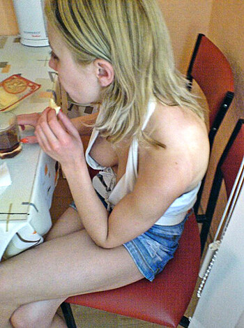 "Here's an image of a bitch slamming down on some fucking sandwich while she blows smoke out her fat ass."