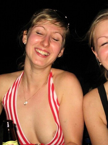 A picture of two nude titties bouncing about in some bathing suits.