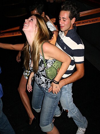 A drunk couple grinding on each other at a fucking bash, both chuckling like retards.