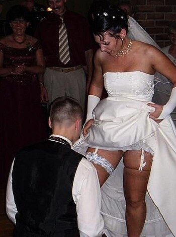 "Fucking hell, this bitch looks like she's been fucked raw by some asshole, with her torn wedding gown and missing underwear."
