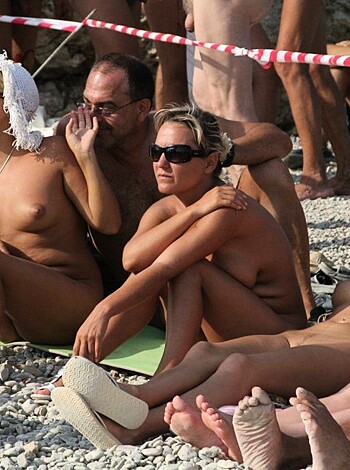 "A fucking bunch of bare tits and asses on the sandy shore, with the ocean as a backdrop."
