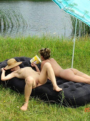 Fuckin' chicks readin' shit while baskin' in the sun, got a fuckin' parasol too.
