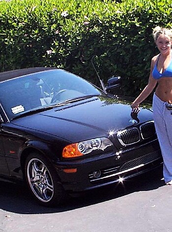 "This fuckin' whore's got a tight ass bikini on, leaning against her goddamn luxury ride. What a classy hoe."