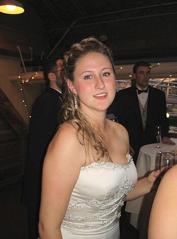 A fucking wedding dress that exposes the bride's ample tits through its slutty see-through design, highlighting her cleavage.