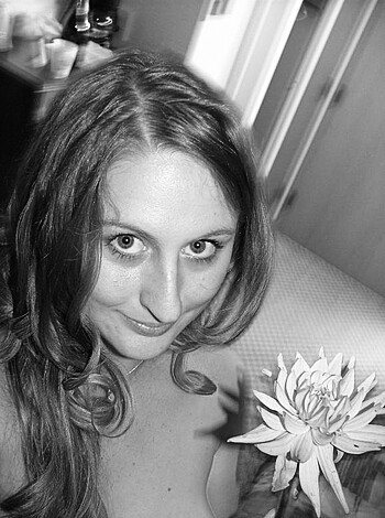 "Here's a fucking picture of some cunt holding a dick-suckin' flower."
