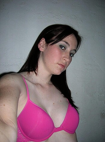 "Masturbating milf with tight tits and erect nipples wearing pink panties."