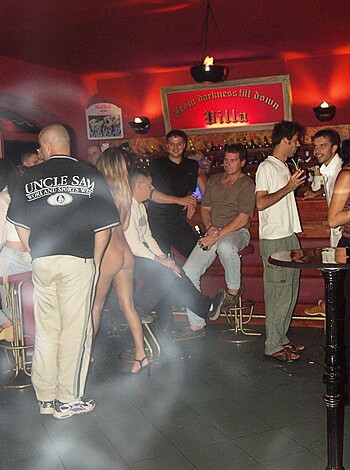 "Fuckin' check out these drunken fuckers getting shittfaced at some bar."