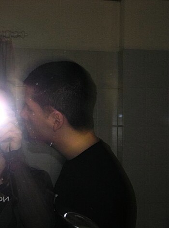 "Check out this chick getting a sloppy bj in the mirror while her boyfriend jacks off watching."