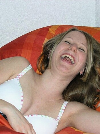 "See this naked bitch on the fucking bed? She's got her fat ass propped up, laughing like a goddamn lunatic while she fondles her tits. Fuckin' A."