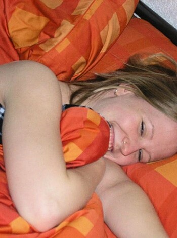 """
Fucking hot babe, chillin' on some fucking Orange sheets, her fucking face all fucking happy and shit!
"""