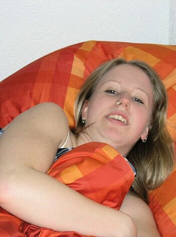 A nude bitch laying on her back with no drawers on her ass, staring at the ceiling while she enjoys her slumber.