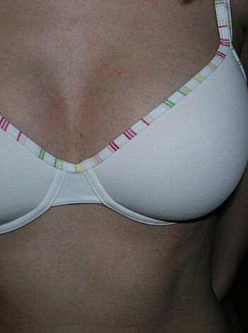 Here's a fucking hot picture of a smoking-hot chick wearing her tight, white bra for all the world to see. You can almost hear her nipples hardening as that soft fabric clings to her perfect tits. Fuck yeah!