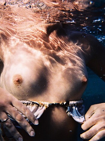 F**k me running, check out this fine-ass naked bitch getting wet in the f**king water.
