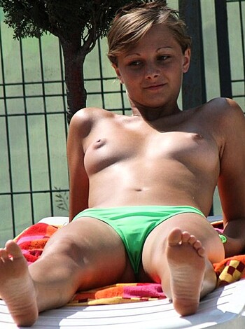 Description: Uncovered tit-ass chick with a set of knockers, no bra.