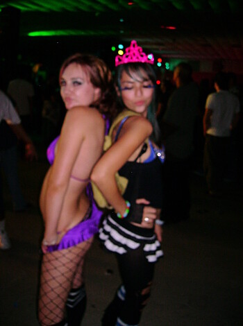 Dudes! Look at these two fucking sluts dressed up like whores at some goddamn rave party, man!