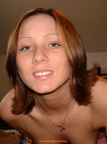 "
Check out this hot bitch with a dick-sucking smile, rockin' some neck jewelry."
