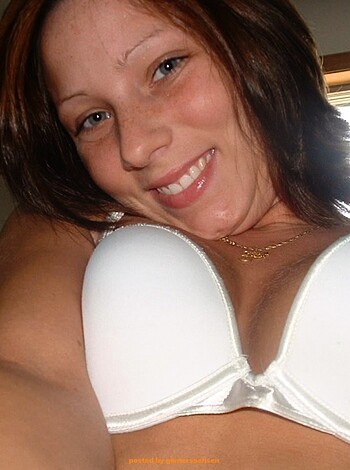 "
Check out this hot chick in her tight white bra with puffed up tits staring directly at ya! 
"