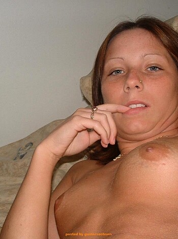 Vulgar description: A naked female ass with fingers on its clitoris.