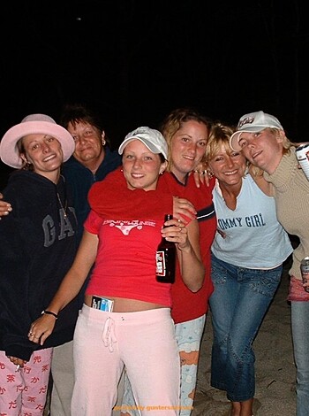 "Bikini-clad bitches catch some waves on a hot summer night."