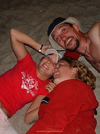 "Here's two bitches rockin' matching red shirts and some dude grabbin' 'em by their arms."