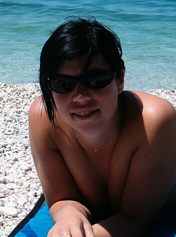 "Fucking hot ass bitch lying topless on fuckin beach."