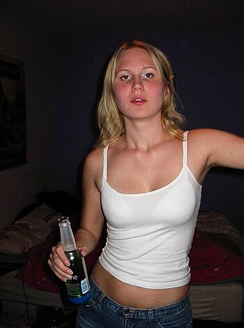 "Fucking hot chick dressed up in a fucking tight white t-shirt, showing off her sweet little ass and sexy thighs while posing for a photo shoot."