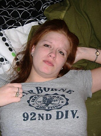 "Look at this fuckin' chick, she's all laid out on her goddamn mattress with that boring gray shirt, staring right into my soul with those blank eyes of hers."