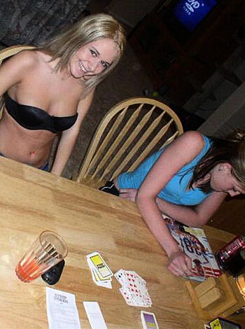 "Fucking two bitches play poker wit bra n bellies exposed."