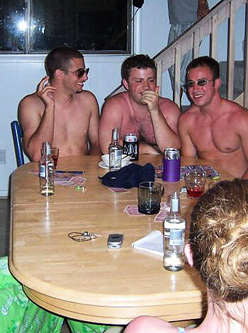 A bunch of fucking drunks with their tits out, sitting around a goddamn table like it ain't no thing, passing the motherfuckin' bottles back and forth like they own the place.