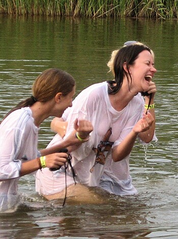 "Dykes gettin' wet and gigglin', up to their tits in the ocean."