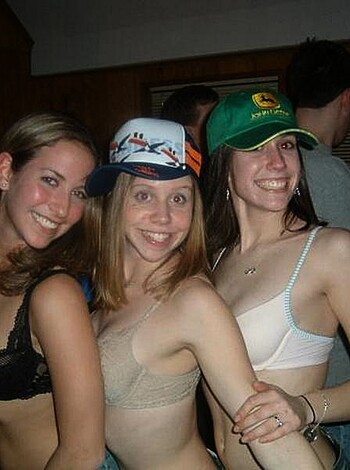 Here are three hot chicks dressed in skimpy underwear partying their tits off, showing off their racky goodness to anyone who cares to look.