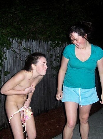"Here's a fuckin image of some chick wif a pink dildo up her twat n shit while some other bitch looks on from behind like a goddamn voyeur in some back alley shithole at night. Nasty."