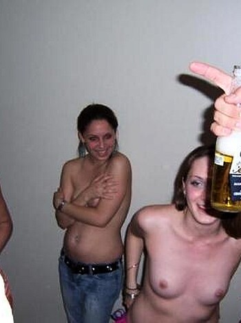 Three topless chicks getting fucked up at a rager.