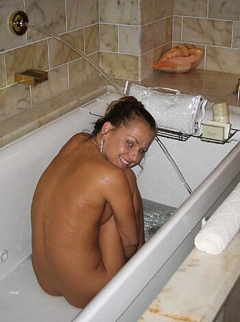 """
An unrestrained female taking a shit in a fucking tub with water.
""