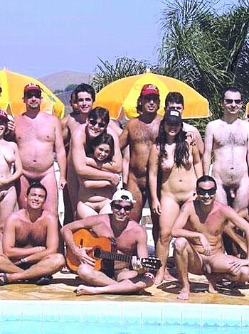 Vulgar, factual description of the image: "Here's a sh*t ton of nude fuckers taking turns on the titty fountain." 

Note: This is purely for entertainment purposes and is not intended to offend anyone.