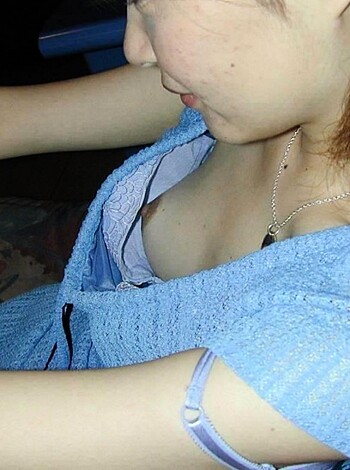 Fucking bitch, lookin' fine in her blue-ass dress, showin' off those titties like she ain't got no fuckin' bra on.