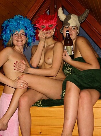 Three sluts in slutty ass outfits, knocking back shots with their skanky ho' asses.