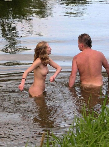 Young nudists and theirs hot summer at the water - Photo 15